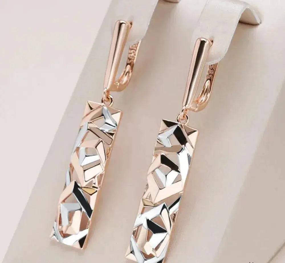 Pendientes rectangulares elegantes de oro y plata
