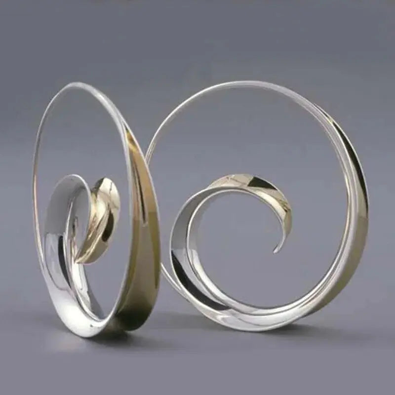 Pendientes vintage con olas en espiral