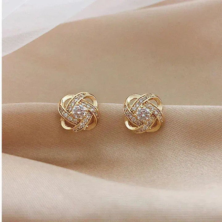 Pendientes de Cruz en Espiral de Flores