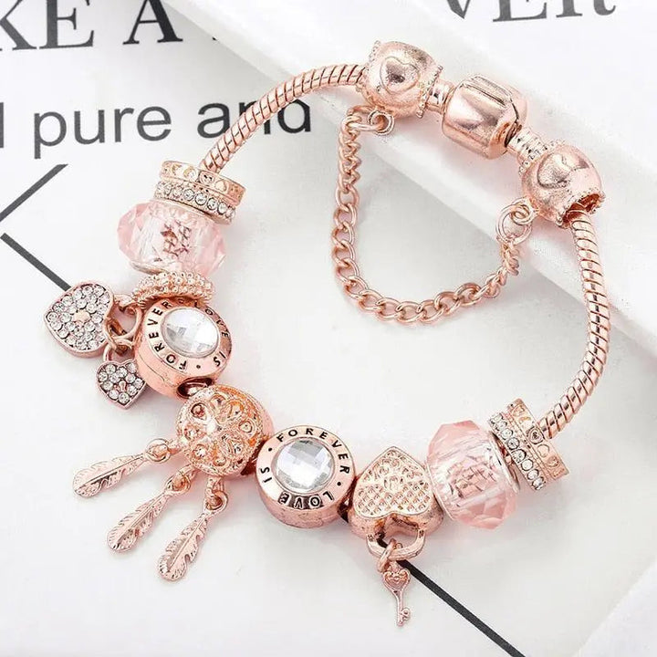 Pulsera Atrapa Sueños de Rosa con Charms en Plata de Ley Incluida