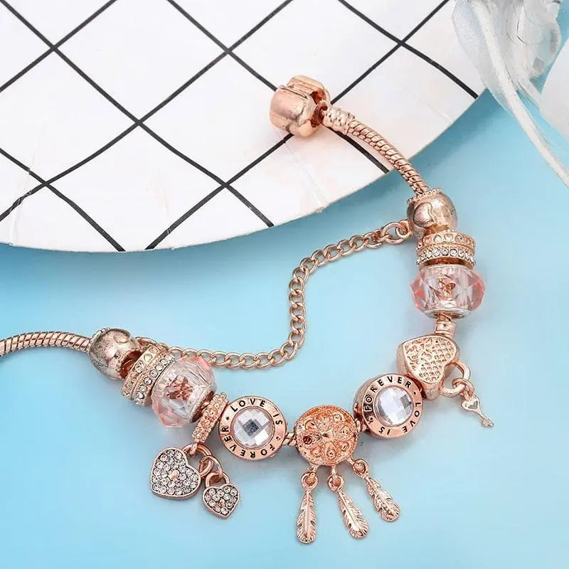 Pulsera Atrapa Sueños de Rosa con Charms en Plata de Ley Incluida