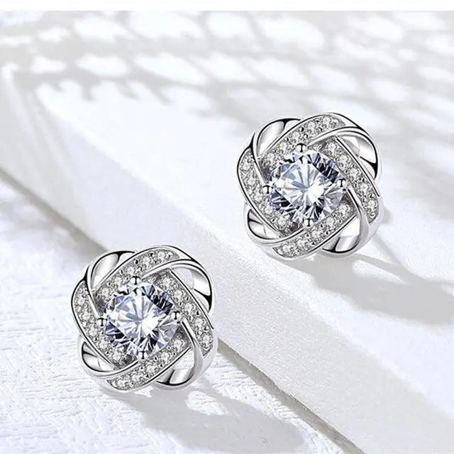 Pendientes de Cruz en Espiral de Flores