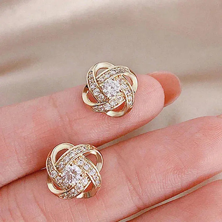 Pendientes de Cruz en Espiral de Flores