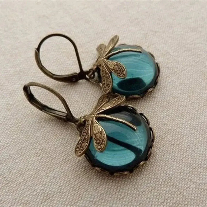 Pendientes de libélula esféricos en oro antiguo