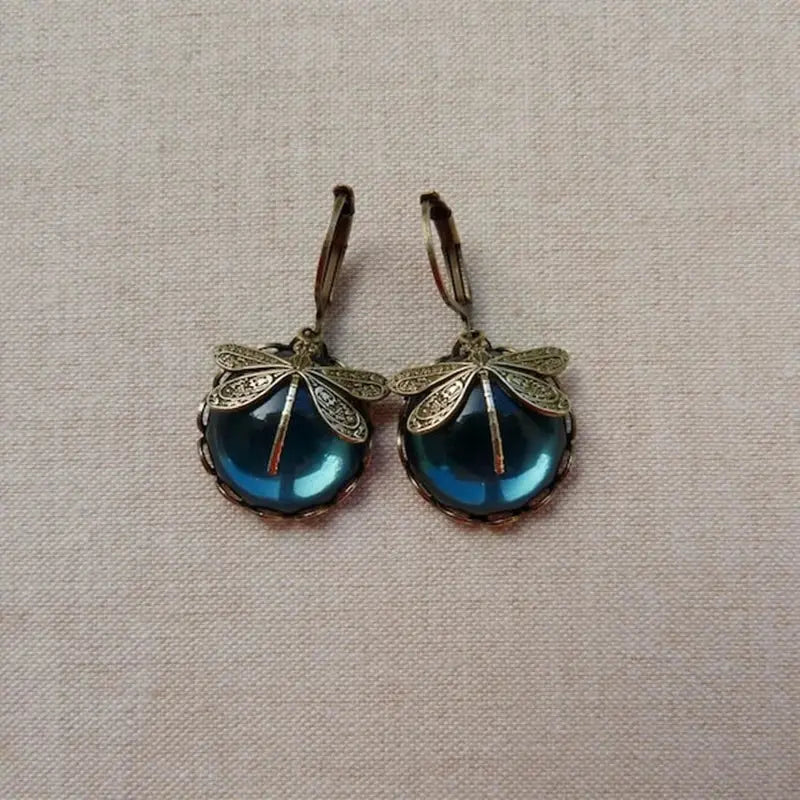 Pendientes de libélula esféricos en oro antiguo